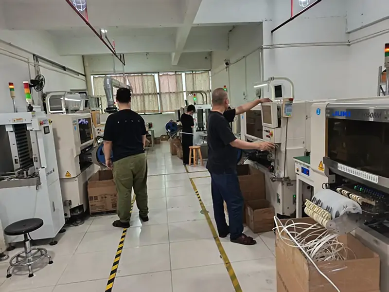 Hardware engineering team operating SMT production lines inside the family-powered Shenzhen factory, welcoming direct B2B inquiries for custom smart switches.